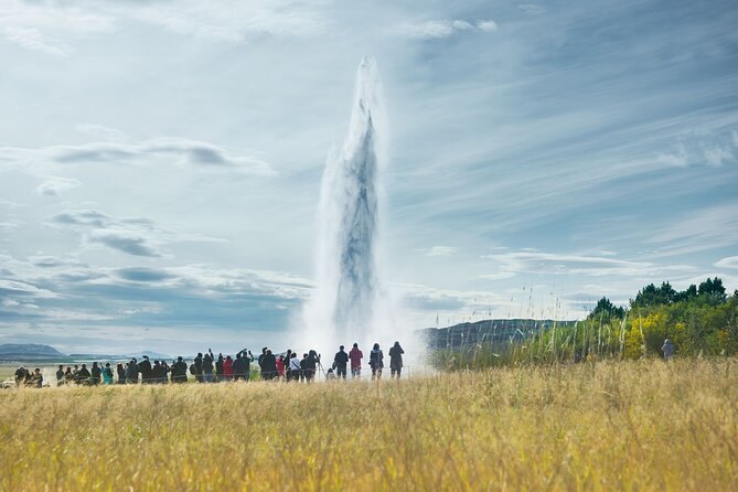 Visitors along the rope watching Strokkur erupt at the Geysir field